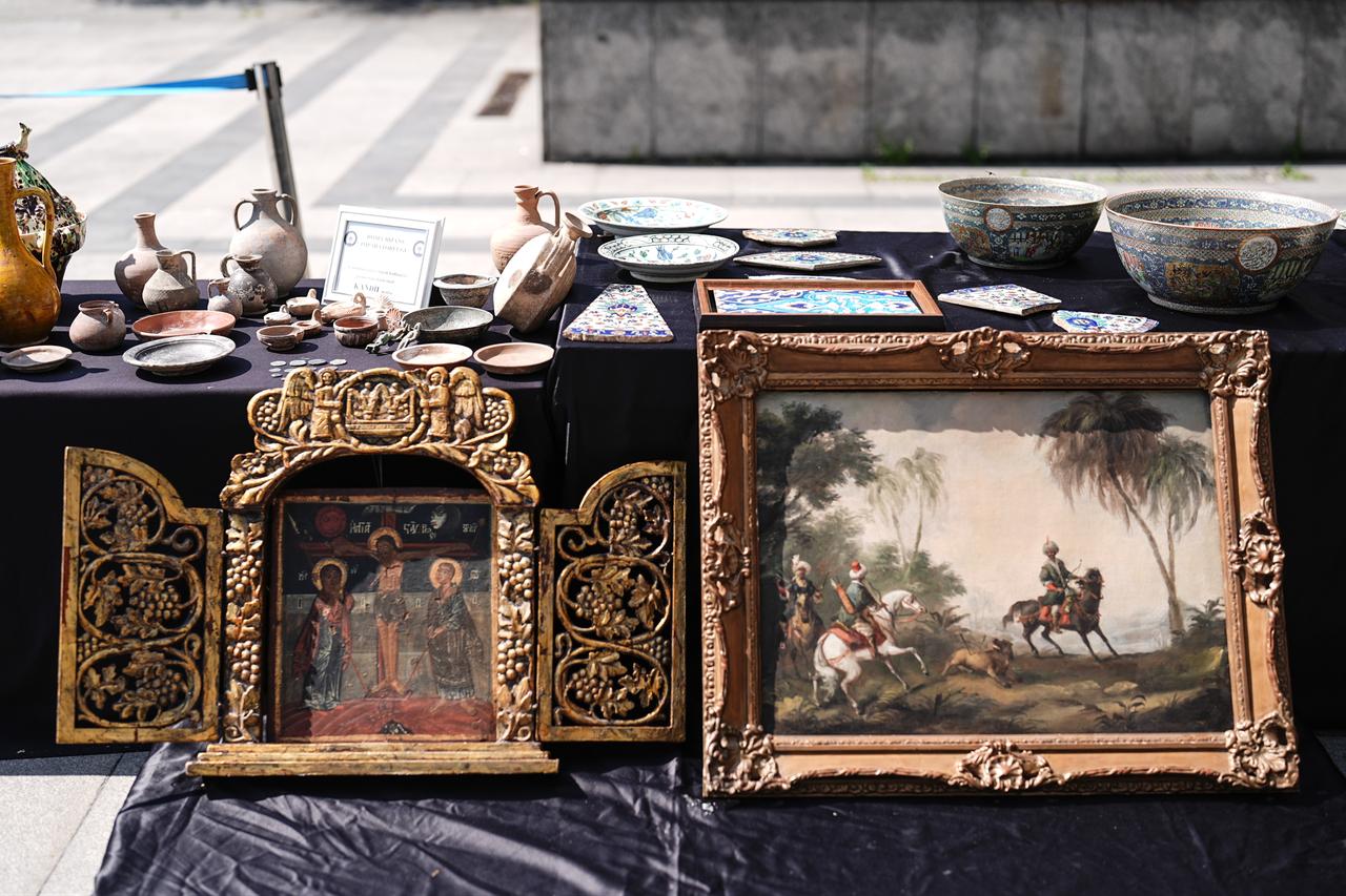 Historical artifacts and objects seized during operations against cultural property smuggling are displayed in Istanbul on April 24, 2026. (AA Photo)