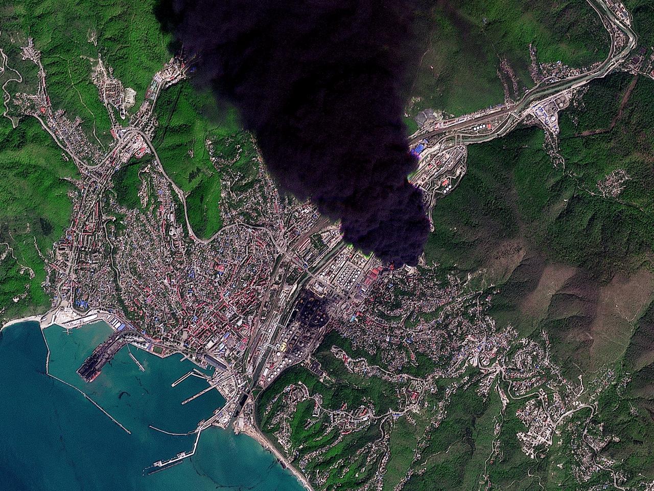 This handout satellite image released by 2026 Planet Labs PBC on April 29, 2026, shows a plume of smoke rising from the Tuapse oil refinery in the Russian port of Tuapse, south-western Russia, on April 28, 2026. (Photo by Handout/2026 Planet Labs PBC/AFP)