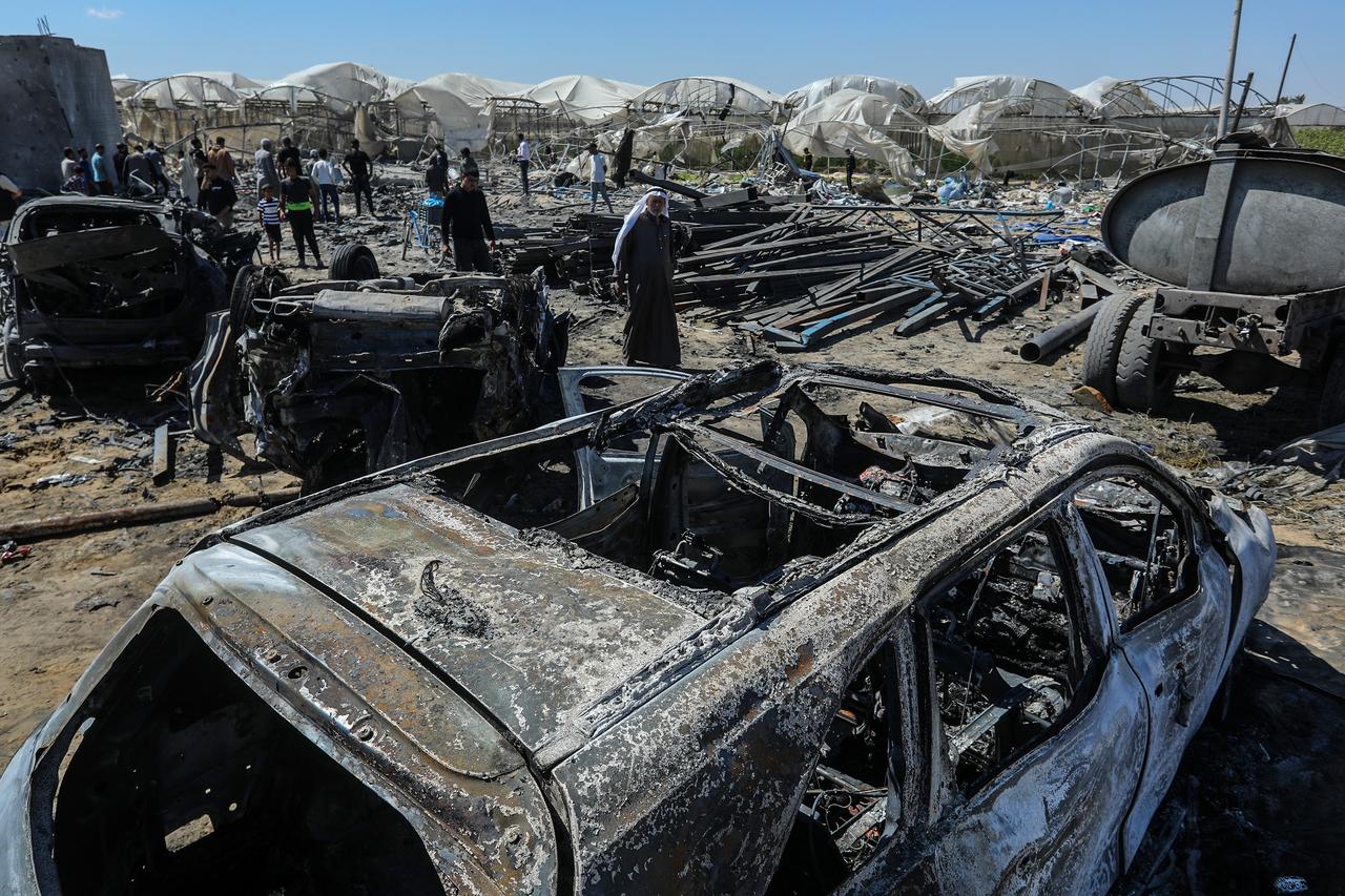 A view of the destruction at the Al-Mawasi area, where an Israeli strike targeting a food warehouse and an open area caused significant damage to vehicles in Khan Yunis, Gaza, Palestine, May 29, 2026. (AA Photo)