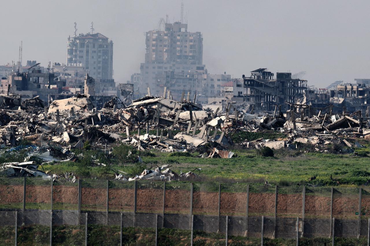 This picture, taken from a position at Israel's border with the Gaza Strip, shows destroyed buildings in the besieged Palestinian territory on February 5, 2026. (AFP Photo)