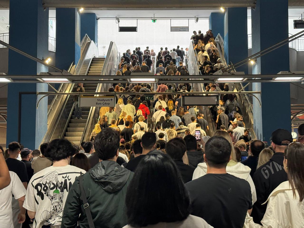 Concertgoers crowd escalators and walkways at a metro station serving Ataturk Olympic Stadium ahead of Kanye West's concert in Istanbul, Türkiye, May 30, 2026. (AA Photo)