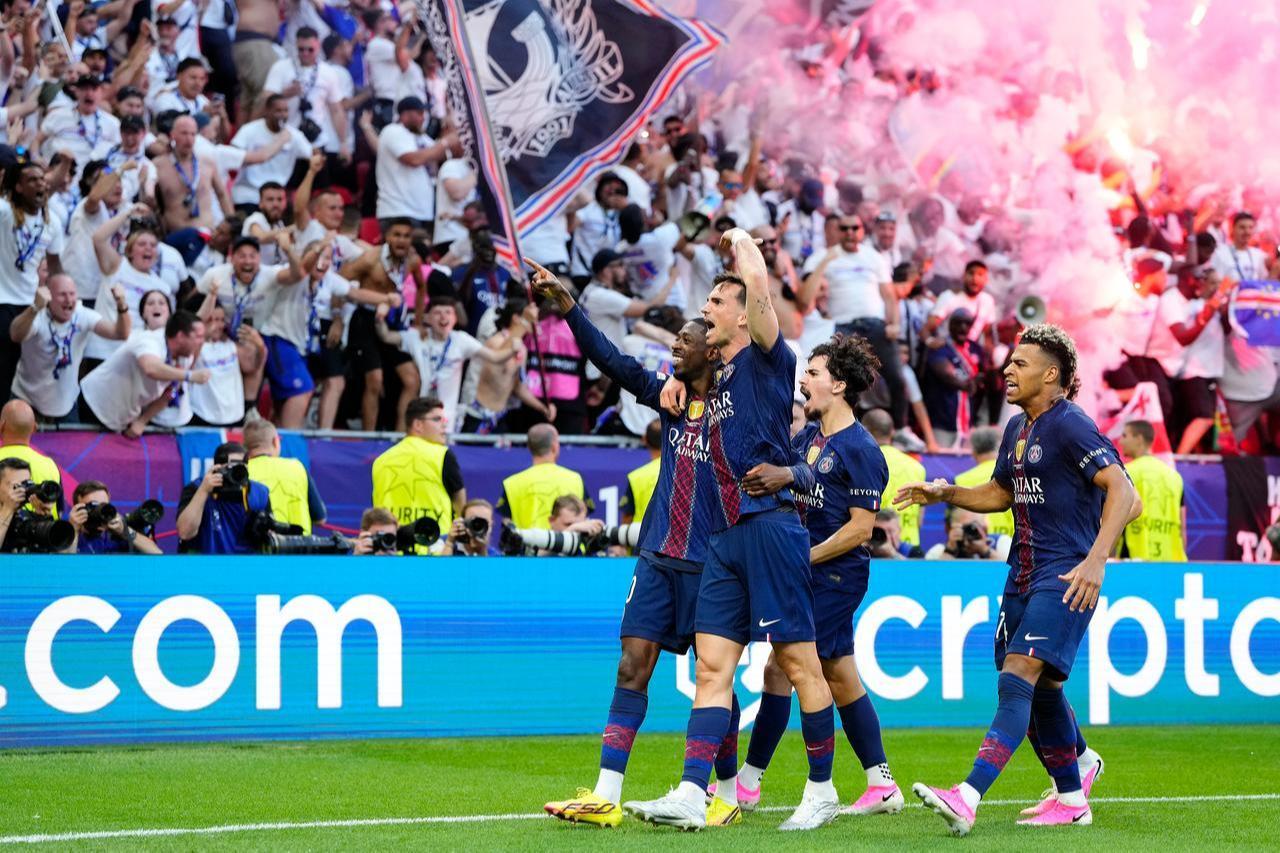 Ousmane Dembele right winger of PSG and France celebrates after scoring his team‘s first goal with team matesduring the UEFA Champions League Final 2026 match between Paris Saint-Germain and Arsenal FC at Puskas Arena, May 30, 2026 in Budapest, Hungary. (AA Photo)