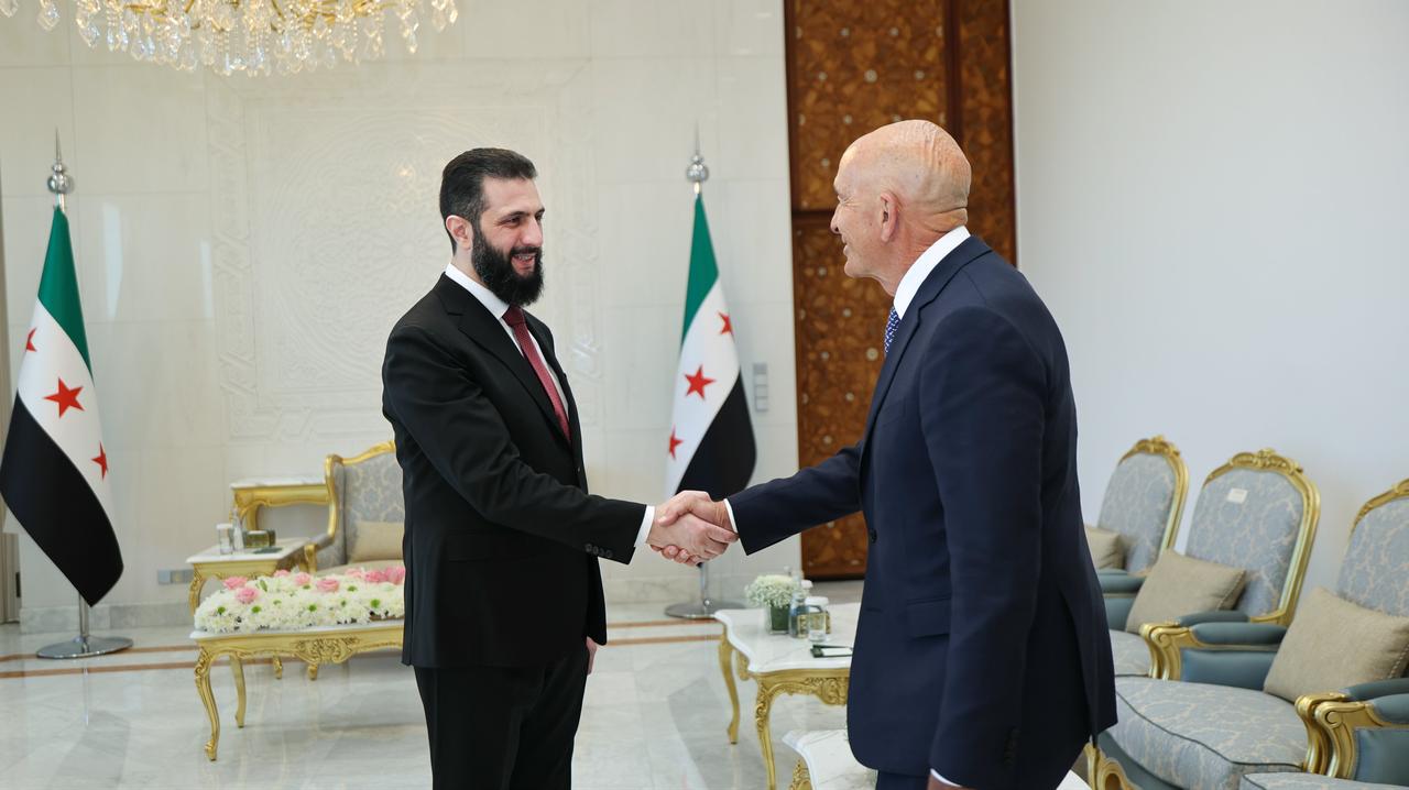 Syrian President Ahmed al-Sharaa (L) receives US Special Envoy for Syria Thomas Barrack (R) at the People’s Palace in Damascus, Syria on May 16, 2026. (Syrian Presidency / Handout/AA Photo)