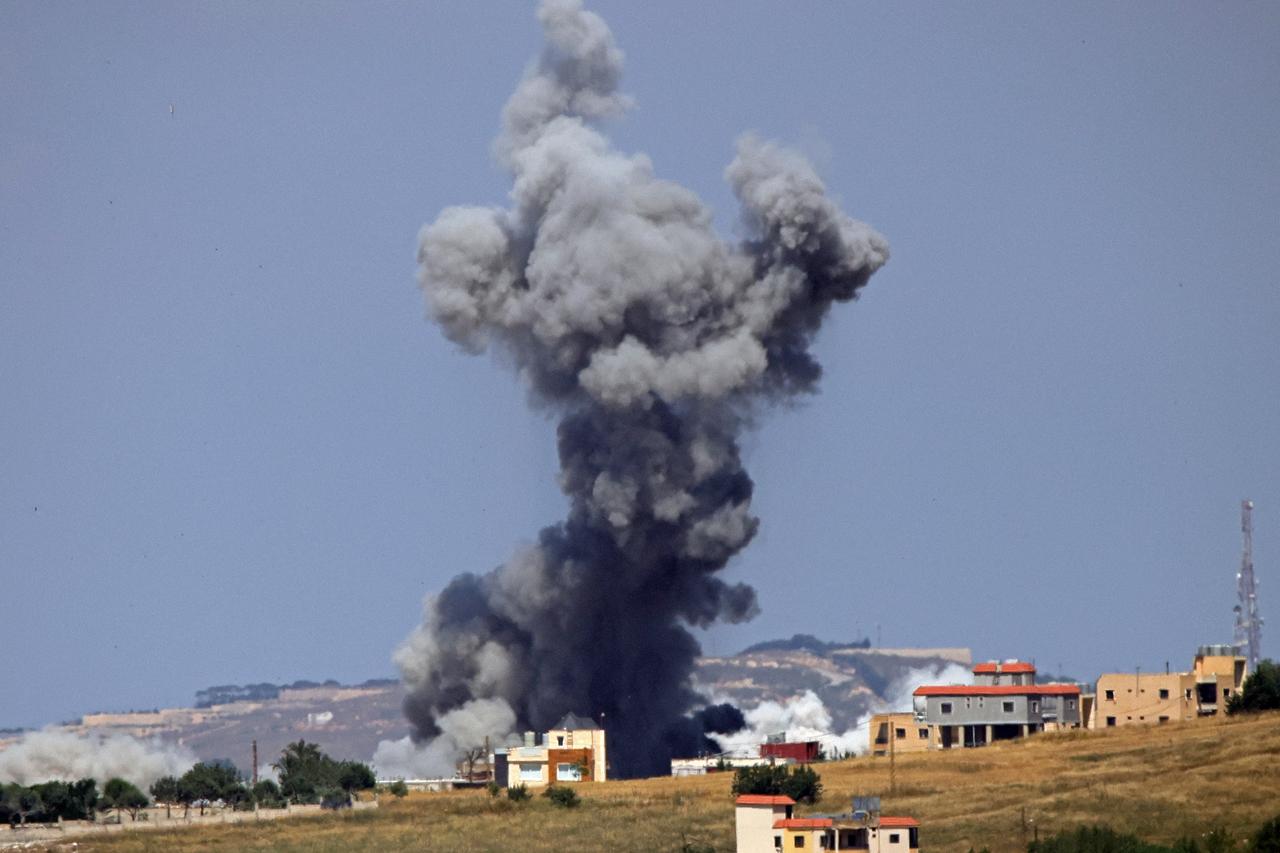 This photograph taken from the Marjayoun area in the southern Lebanon shows smoke rising from the site of an Israeli strike in Kfar Tibnit on May 31, 2026. (AFP Photo)