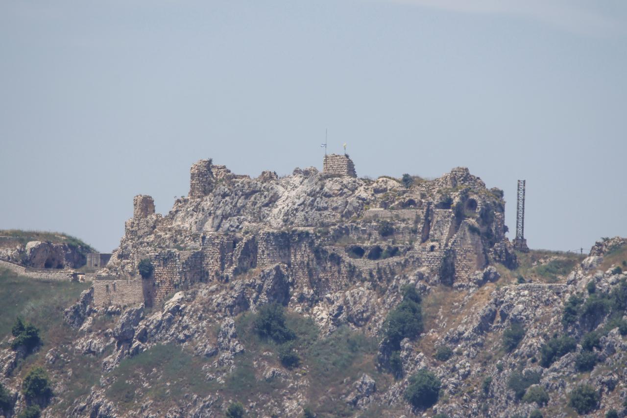 An Israeli flag is seen flying over the historic Beaufort Castle (Shaqif Arnun) as Israeli forces occupied the strategic hilltop site of Beaufort Castle (Shaqif Arnun), despite an existing ceasefire at the north of Litani River in Nabatieh, Lebanon on May 26, 2026. (AA Photo)