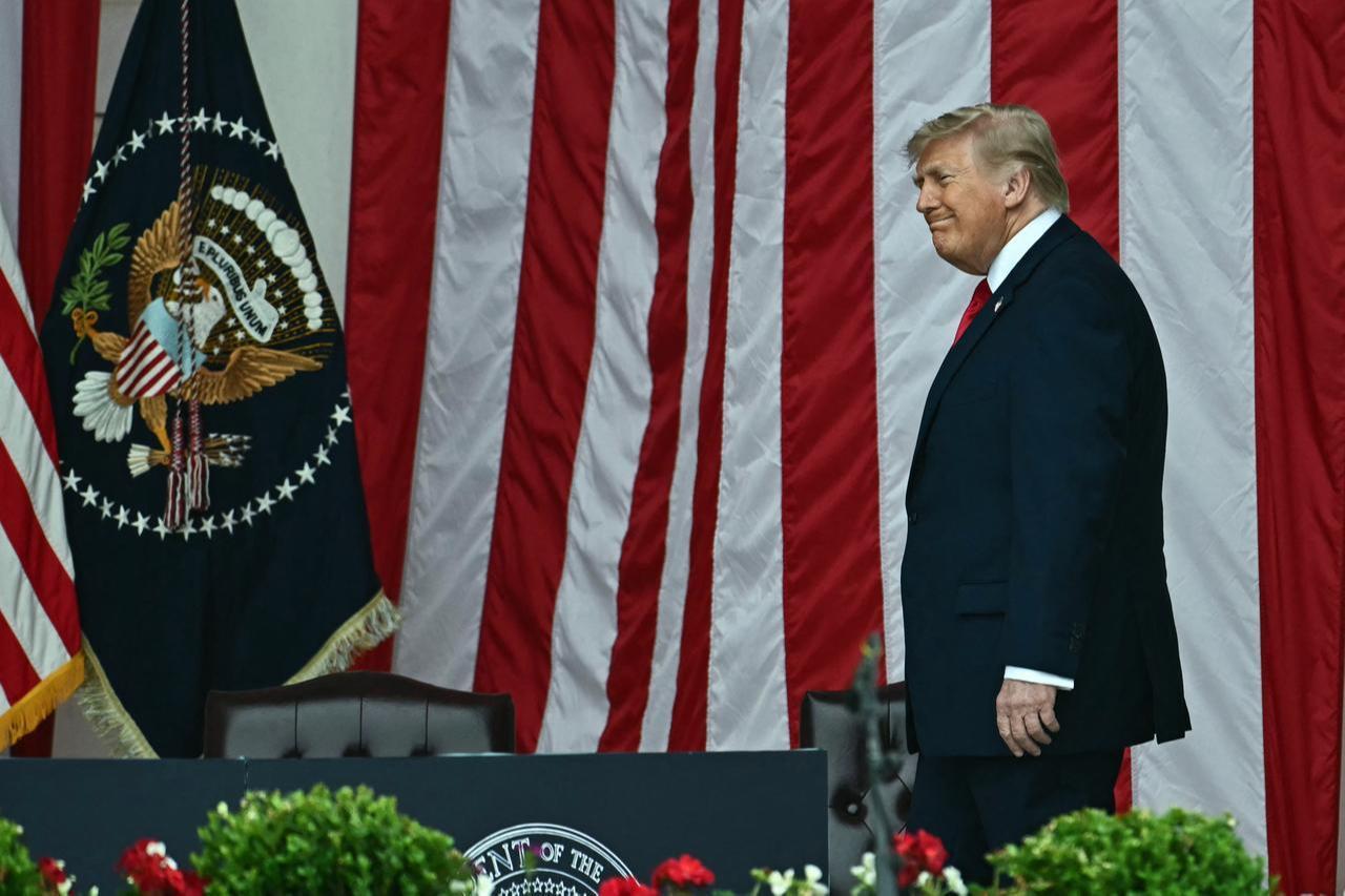 US President Donald Trump arrives to speak during the National Memorial Day Observance at the Memorial Amphitheater in Arlington National Cemetery in Arlington, Virginia, May 25, 2026. (AFP Photo)