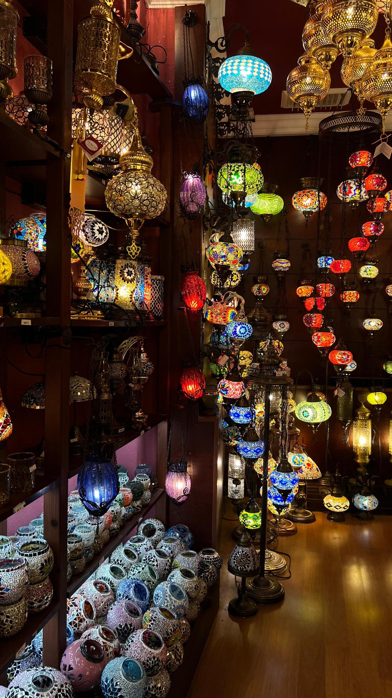 A collection of mosaic lamps on display at the Tuncer shop, showcasing a range of styles and shapes to suit diverse tastes—from designs for houses to those ideal for apartments. (Photo by Türkiye Today)