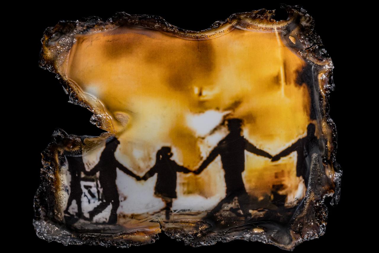 Iranian artist Parisa Azadi burns protest images to keep grief and refusal alive