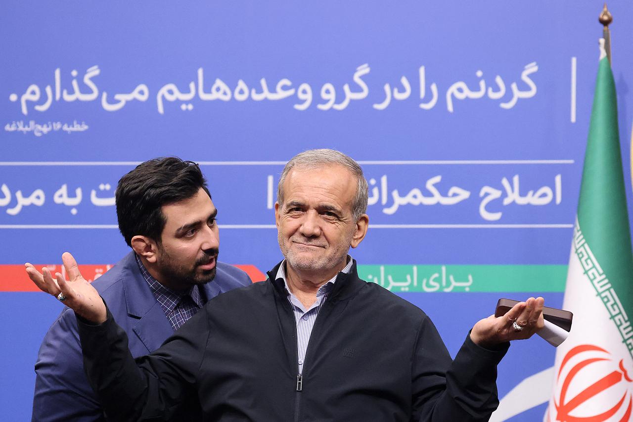 Iran's President Masoud Pezeshkian gestures as he speaks to reporters during his press conference in Tehran on September 16, 2024. (AFP Photo)