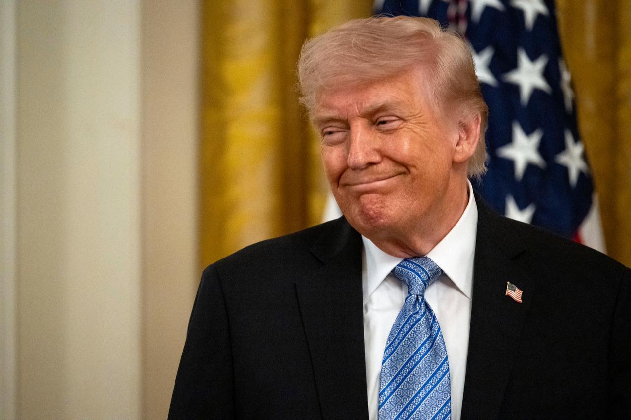 US President Donald Trump smiles as he participates in a Small Business Summit in the East Room of the White House in Washington, DC, May 4, 2026. (AFP Photo)