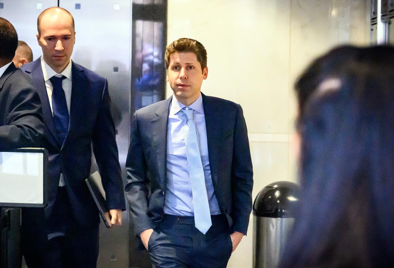 OpenAI CEO Sam Altman (R) and Greg Brockman, OpenAI president and co-founder, arrive at the federal courthouse in Oakland, California, on April 30, 2026 (AFP Photo)