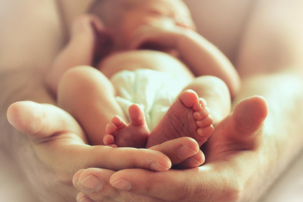 A moment showing a baby resting shortly after being born, accessed on March 21, 2026. (Adobe Stock Photo)