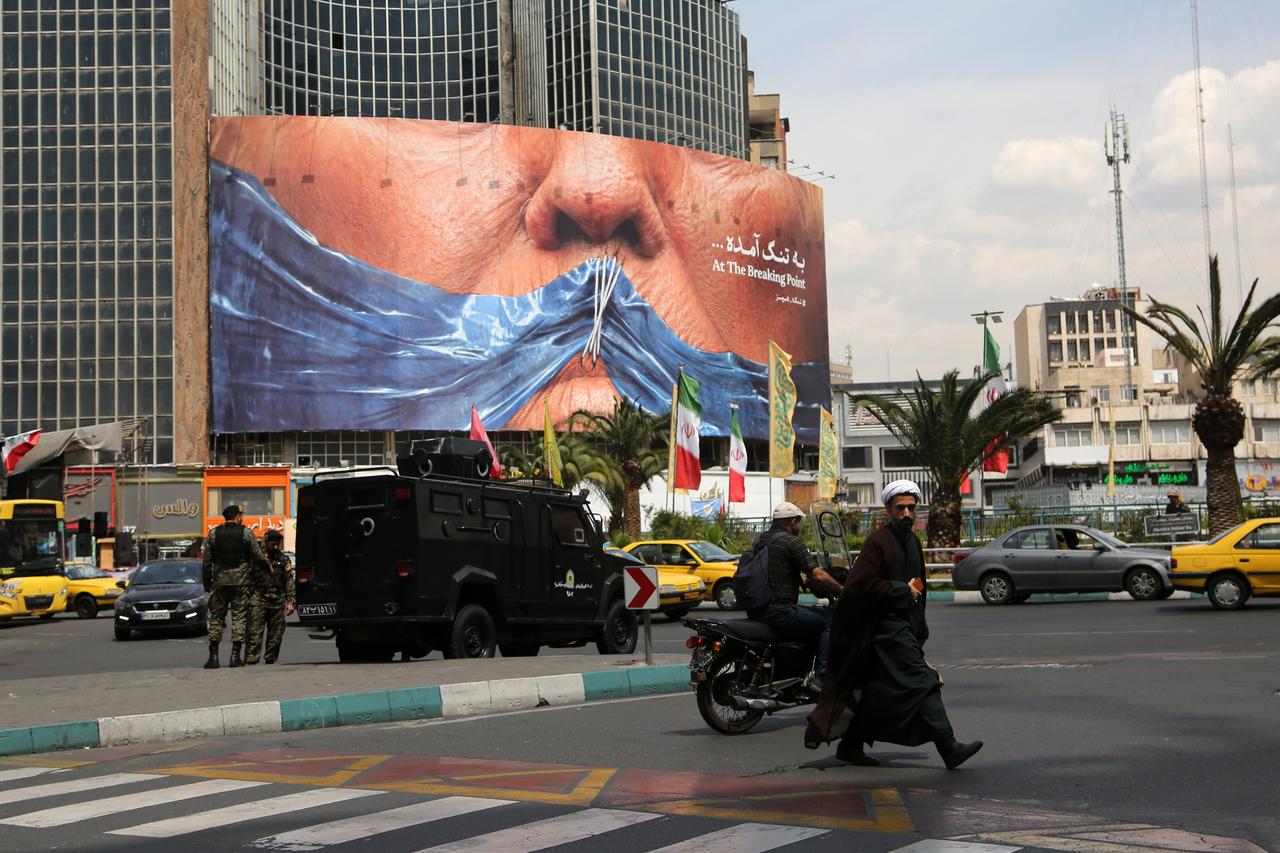 A giant banner depicting the Strait of Hormuz is displayed at Vali-e Asr Square, featuring the phrase “At the breaking point" in Tehran, Iran, May 02, 2026. (AA Photo)
