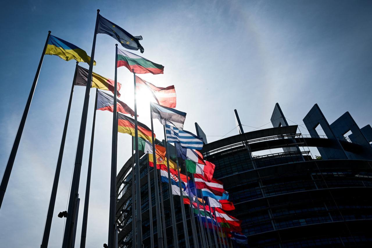 European flag surrounded by the national flags of the EU member states flapping in the breeze in front of the Louise Weiss building in Strasbourg, north eastern France, April 28, 2026. (AFP Photo)