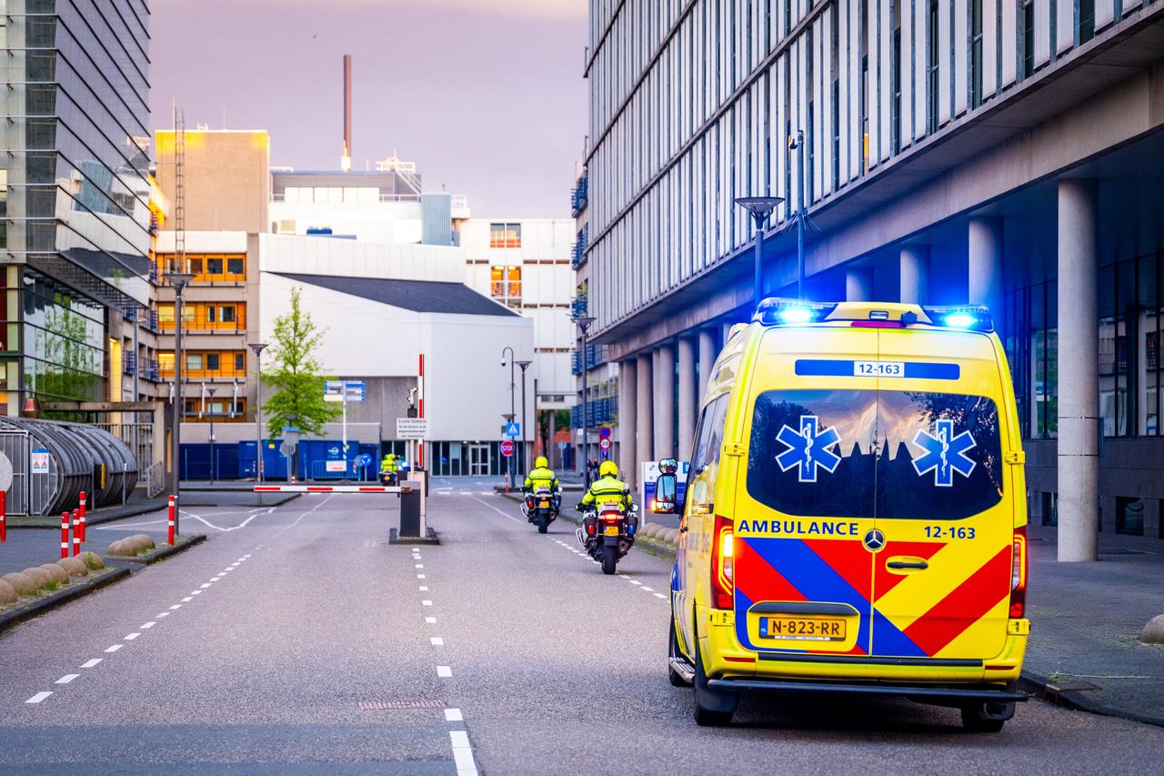 An ambulance allegedly carrying at least one of the passengers from the cruise ship MV Hondius, believed to be infected with hantavirus, is escorted by Dutch police, Leiden, Netherlands, May 6, 2026. (AFP Photo)