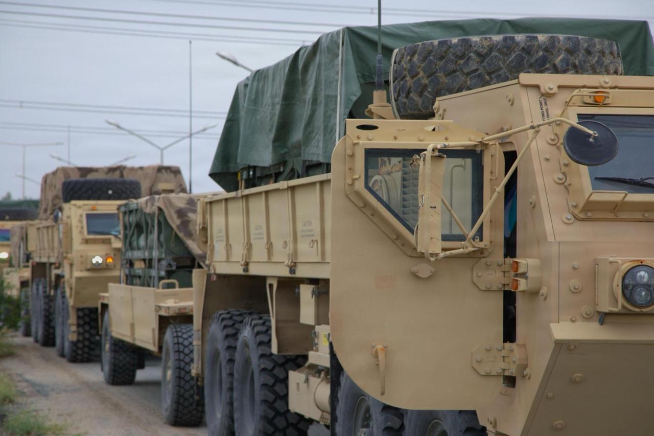 A U.S. Army supply convoy carrying ammunition for the M142 High Mobility Artillery Rocket System (HIMARS) prepares to move out (Photo via U.S. Army)