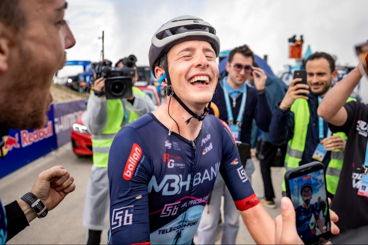 Italy’s Christian Bagatin reacts after winning the Antalya-Feslikan stage, surrounded by team staff and media at the Tour of Türkiye, May 1, 2026. (Photo via Tour of Türkiye)