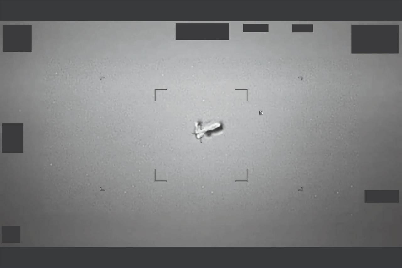 This handout image released by the US Department of Defense on May 8, 2026, shows what the US Indo-Pacific Command reported as UAP that resembles a football-shaped body near Japan.