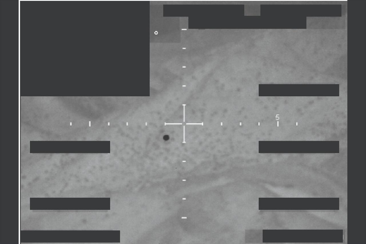 This handout image released by the US Department of Defense on May 8, 2026, shows what the Department of Defense and FBI say is an infrared still image (black hot) captured of unidentified object over western United States in December, 2025.