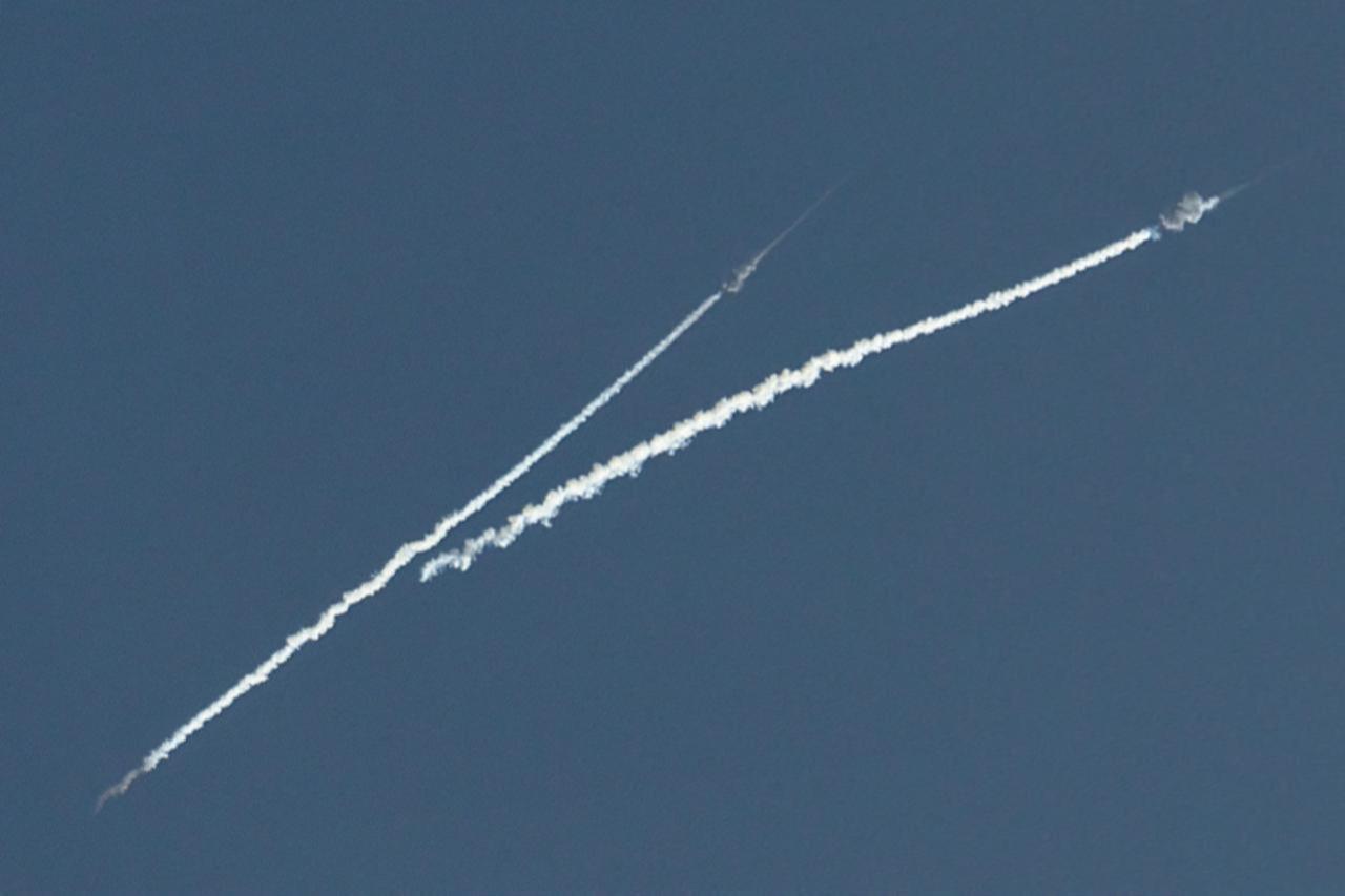 UAE says 3 injured as it intercepts Iranian ballistic missiles, drones