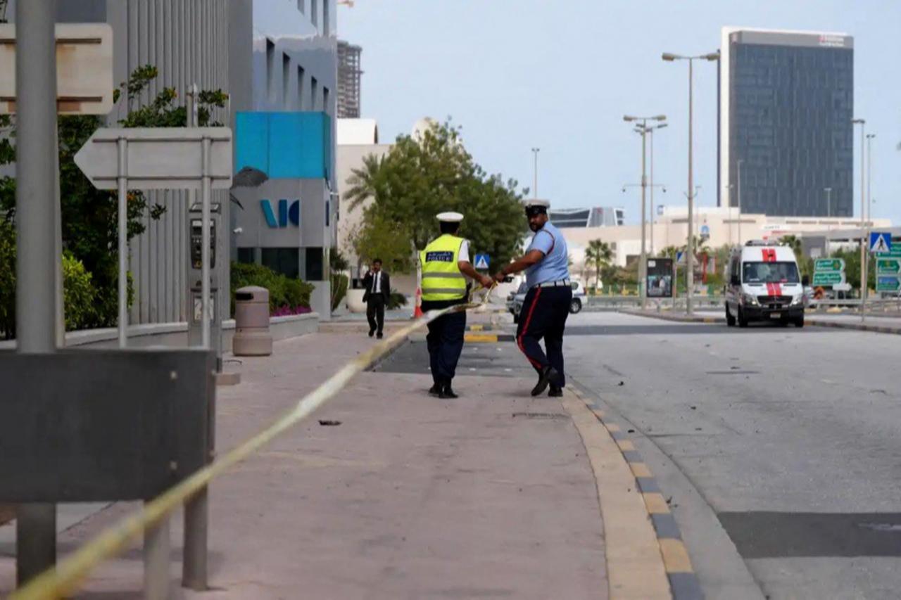 Bahraini police cordon off the area outside the damaged Crown Plaza hotel, following an Iranian military strike, in Manama, March 1, 2026. (AFP Photo)