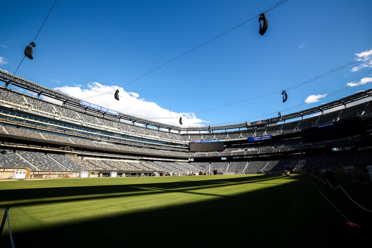 Workers install the pitch at New York New Jersey Stadium (temporarily renamed from MetLife stadium) ahead of the 2026 FIFA World Cup, in East Rutherford, New Jersey, May 7, 2026. (AFP Photo)