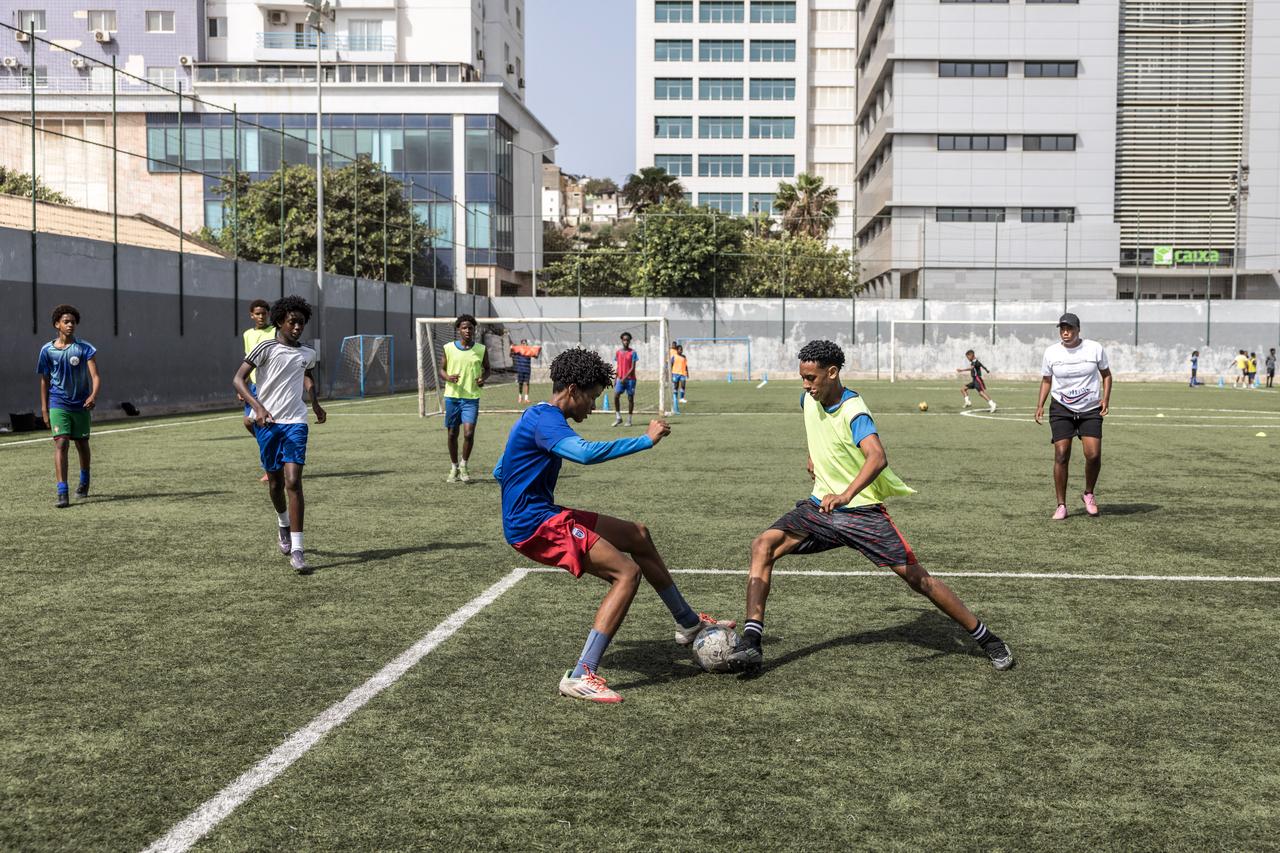 Football students play a game during practice at the Bola Pra Frente (Ball Forward) football academy in Praia Cape Verde, on May 18, 2026. (AFP Photo)