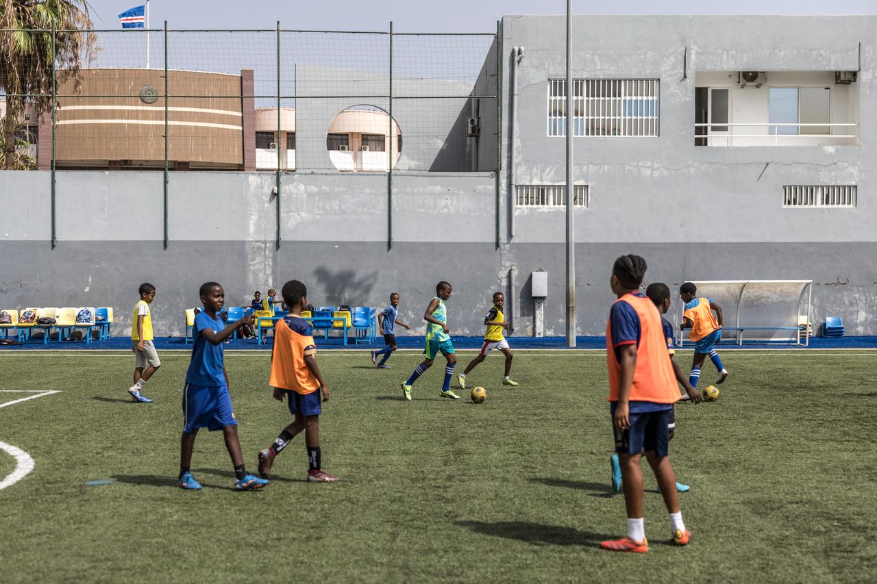 Football students play a game during practice at the Bola Pra Frente (Ball Forward) football academy in Praia Cape Verde, on May 18, 2026. (AFP Photo)