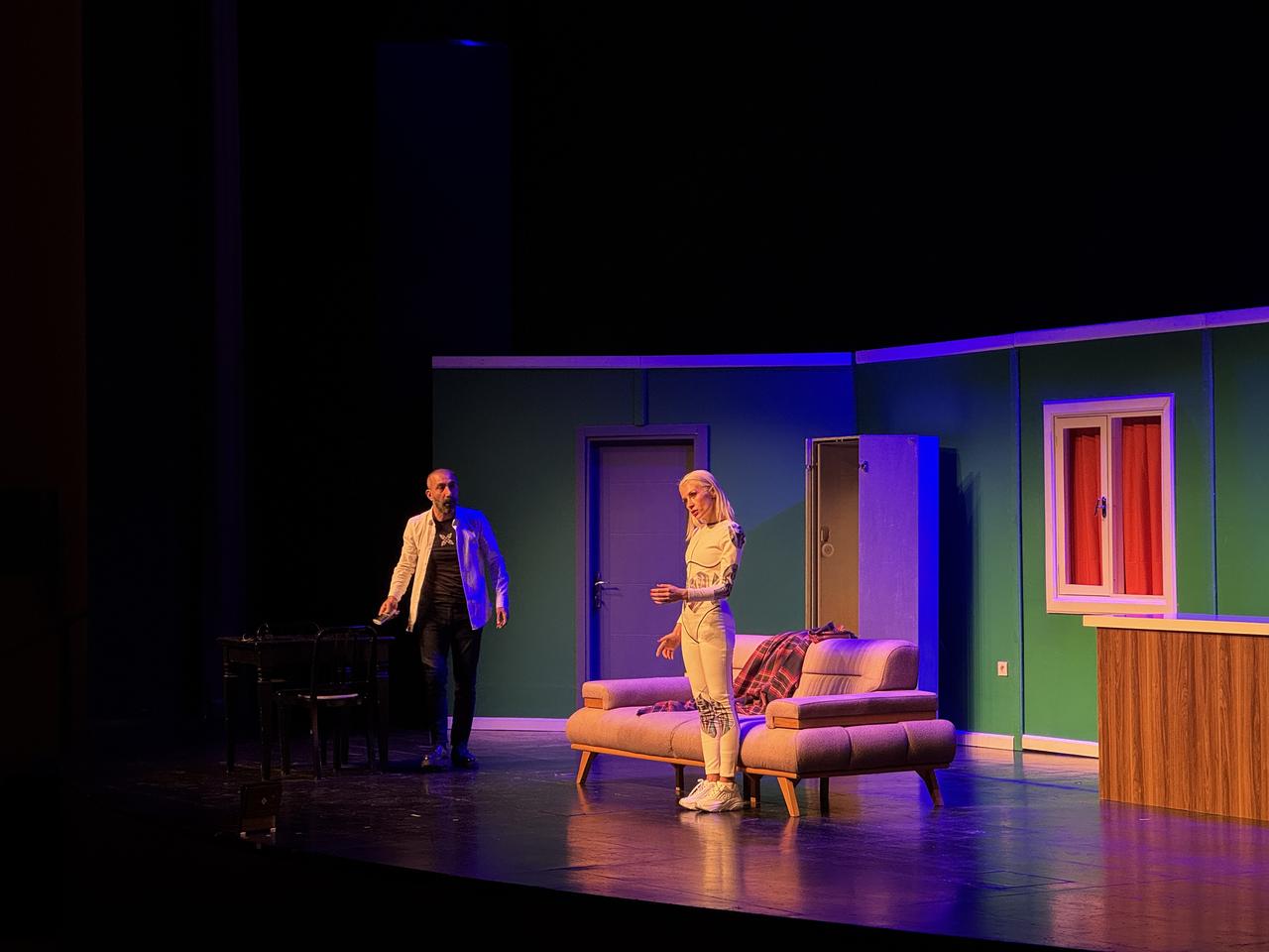 Actors and a humanoid robot perform the play “Şimdi Telefonunuza Bir Kod Gelecek” at Atatürk Cultural Center in Istanbul, Türkiye, May 18, 2026. (AA Photo)