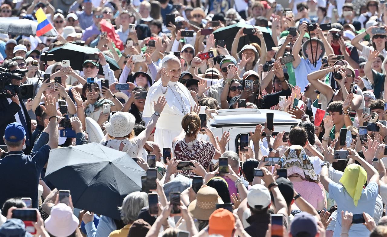 Pope Leo XIV waves as arrives during  his weekly general audience in the Vatican on May 27, 2026. (AA Photo)