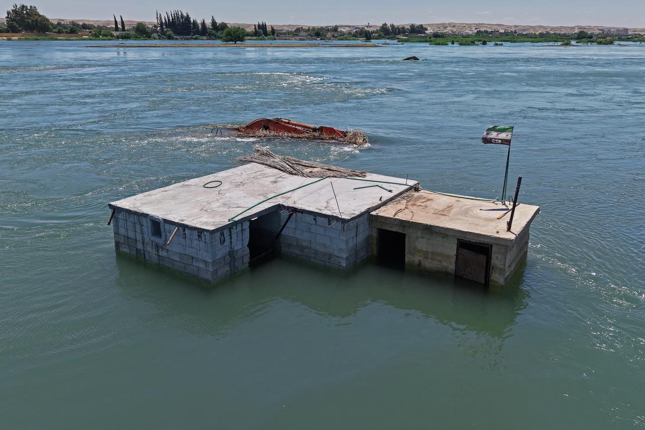 This aerial picture shows an inundated area in Raqa province following recent flooding as water levels rise along the Euphrates River on May 30, 2026. (AFP photo)