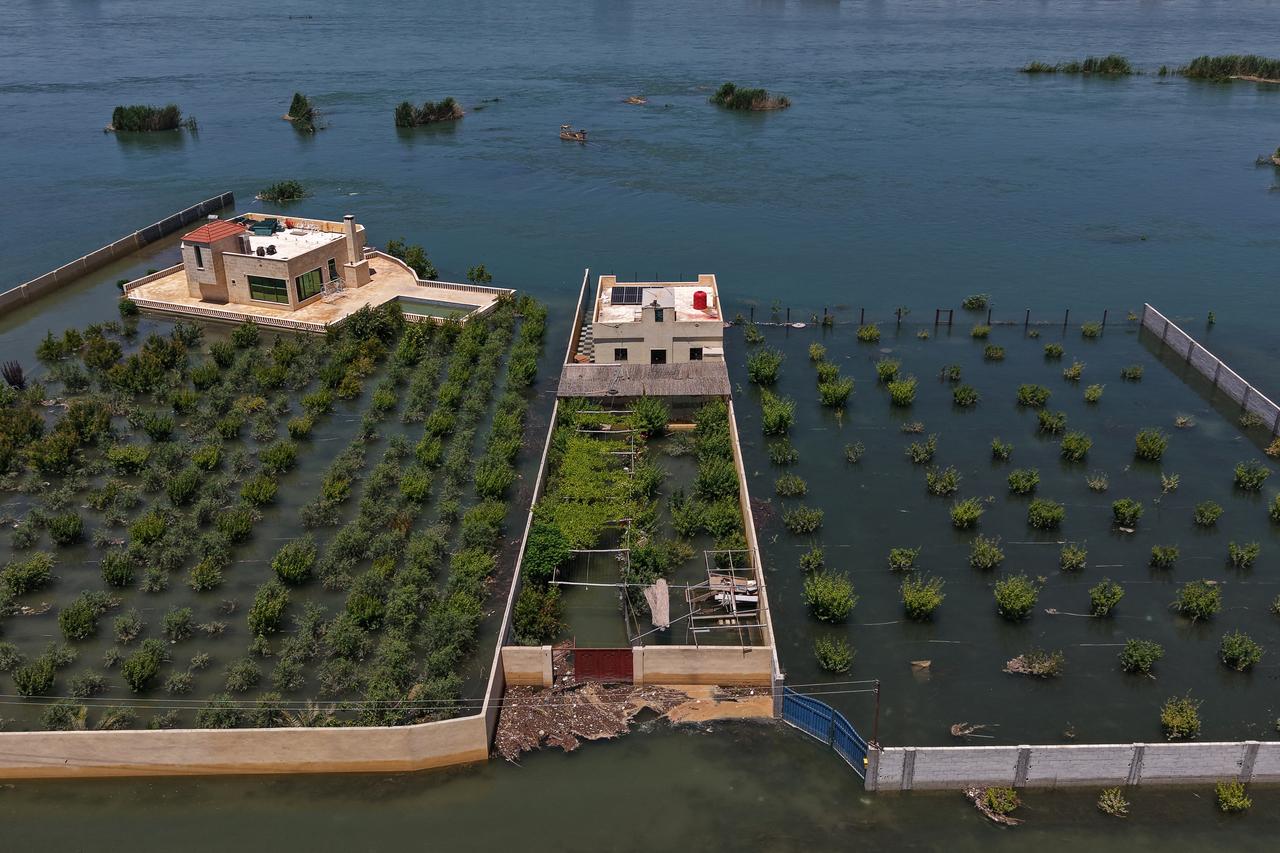 This aerial picture shows an inundated area in Raqa province following recent flooding as water levels rise along the Euphrates River on May 30, 2026. (AFP photo)