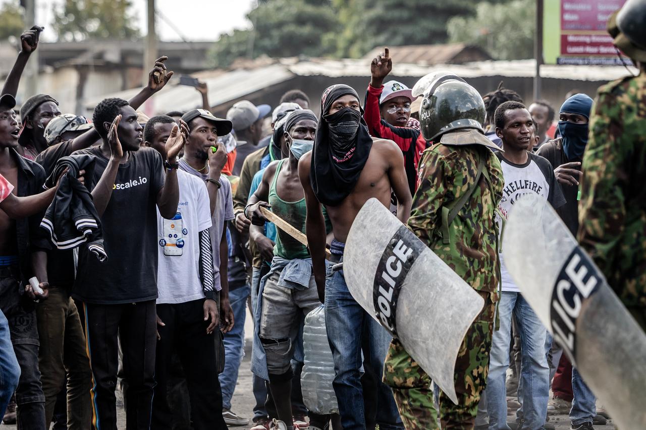Demonstrators chant slogans as they confront Kenyan police officers during clashes at a demonstration against a controversial US-built Ebola quarantine centre slated to begin operations at Laikipia Air Base in Nanyuki, June 9, 2026. (AFP Photo)