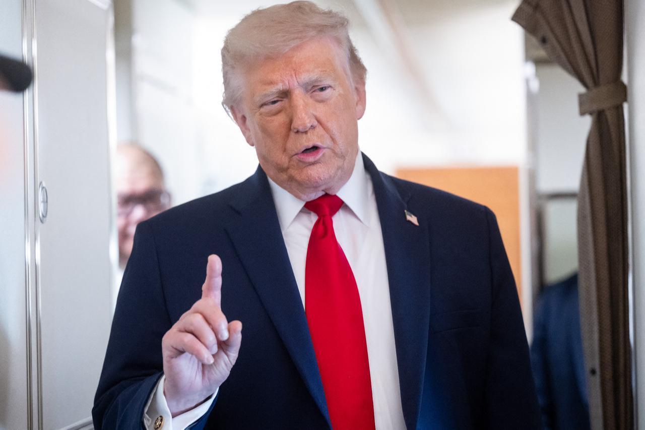 US President Donald Trump gestures as he speaks with the press aboard Air Force One as he flies from Joint Base Andrews in Maryland to Eau Claire, Wisconsin, June 5, 2026. (AFP Photo)