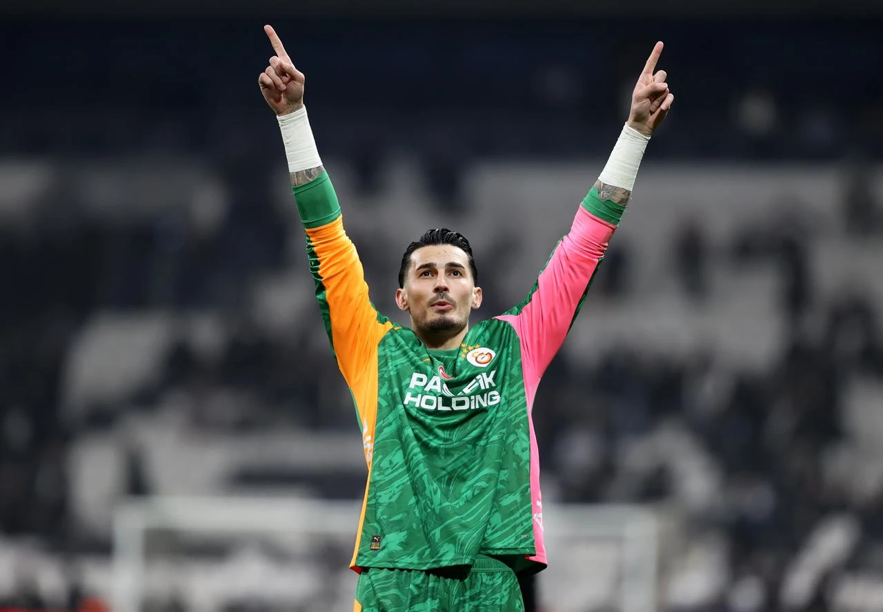 Galatasaray’s Ugurcan Cakir greets fans as he celebrates their victory at the end of the Turkish Super Lig week 25 match between Besiktas and Galatasaray at Tupras Stadium in Istanbul, Türkiye, March 7, 2026. (AA Photo)