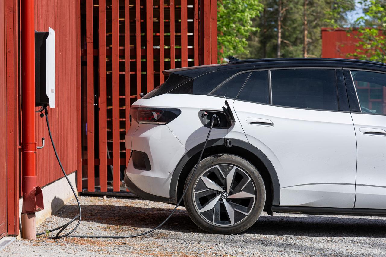 Electric vehicle charges at the BRF Stenberg condominium association on May 28, 2026, in Hudiksvall, Sweden. (AFP Photo)