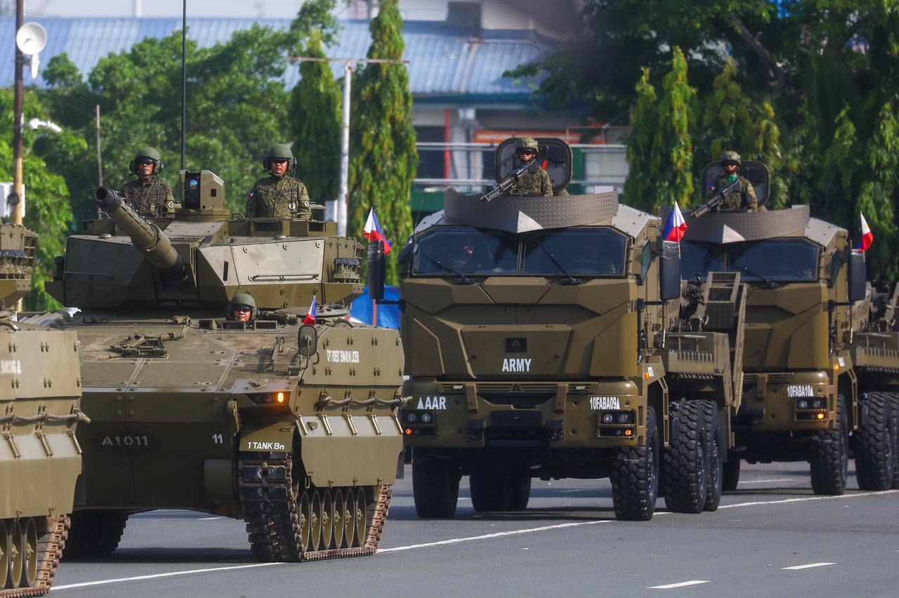 Military personnel manoeuvre tanks, during military parade for the 128th anniversary of Independence Day, in Manila, Philippines, on June 12, 2026. (AA Photo)