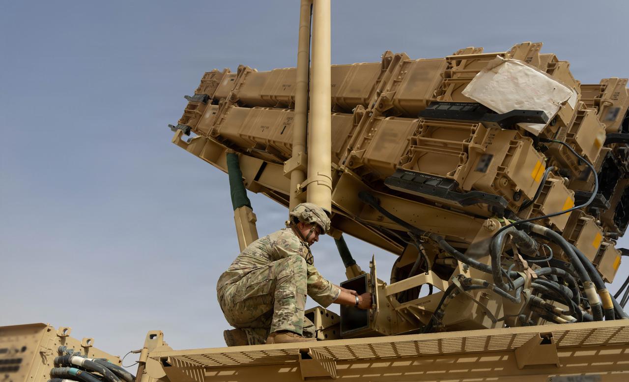 A U.S. Army air defense artilleryman conducts maintenance on an MIM-104 Patriot missile system in the Middle East. (Photo via U.S. Army)