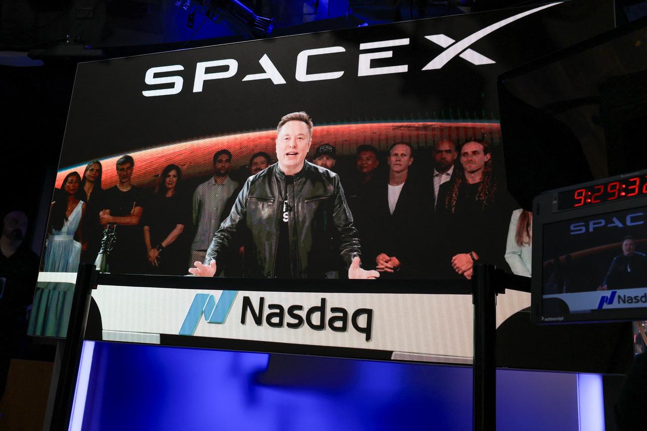SpaceX CEO Elon Musk, displayed on a screen remotely from SpaceX headquarters in Starbase, Texas, speaks before the launch of SpaceX’s initial public offering (IPO) at the Nasdaq MarketSite in New York, June 12, 2026. (AFP Photo)