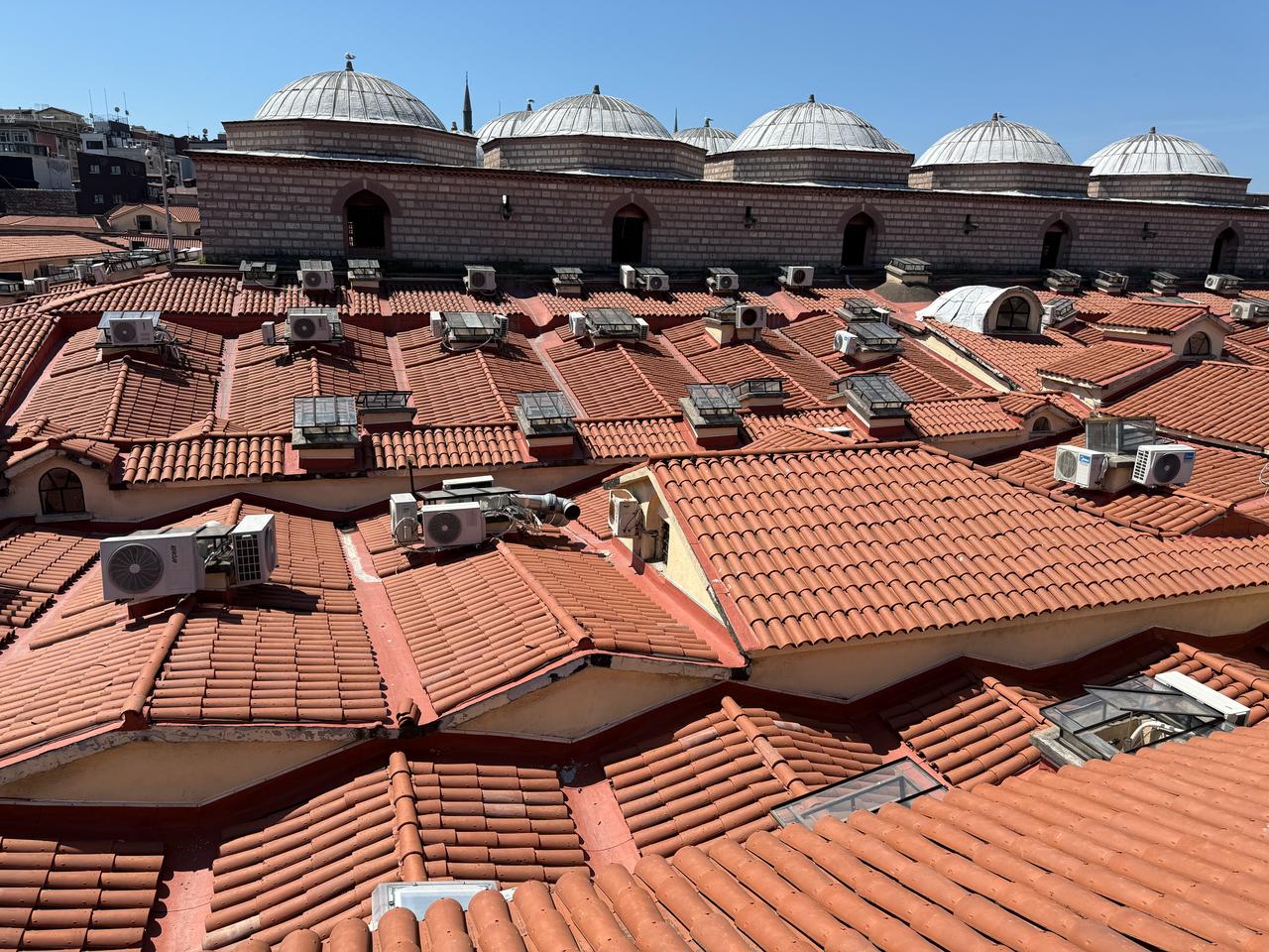 In the guided tour led by expert guides, participants were informed about the historical structure of the Grand Bazaar, which extends from the Ottoman period to the present day. Istanbul, Türkiye, June 13, 2026. (IHA Photo)
