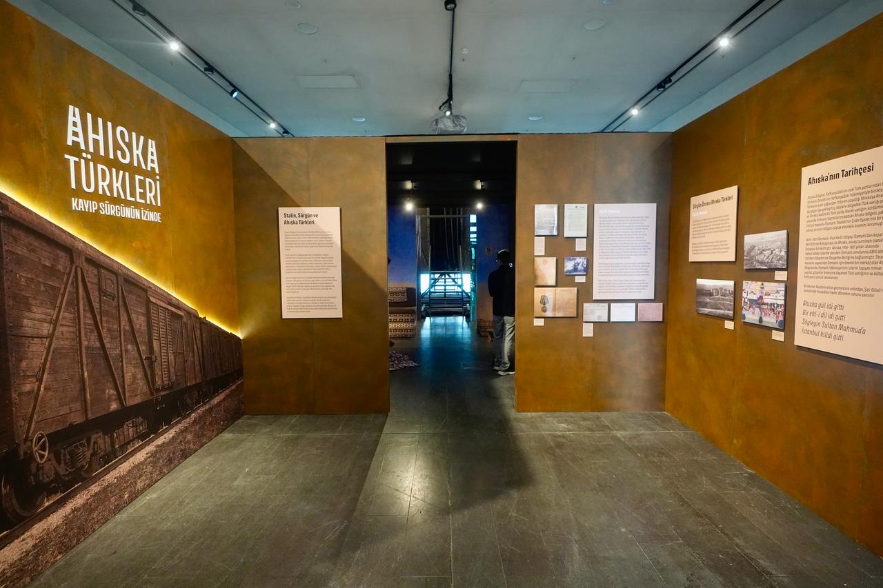 A section of the exhibition presents the historical background and forced exile of Meskhetian Turks at AKM Art Gallery in Istanbul, Türkiye. (AA Photo)