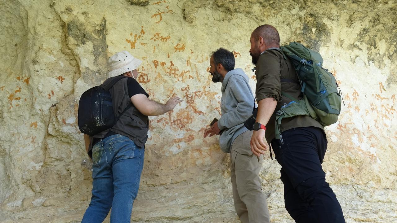 Researchers inspect prehistoric cave paintings discovered in Tohma Canyon, Malatya, eastern Türkiye. (IHA Photo)