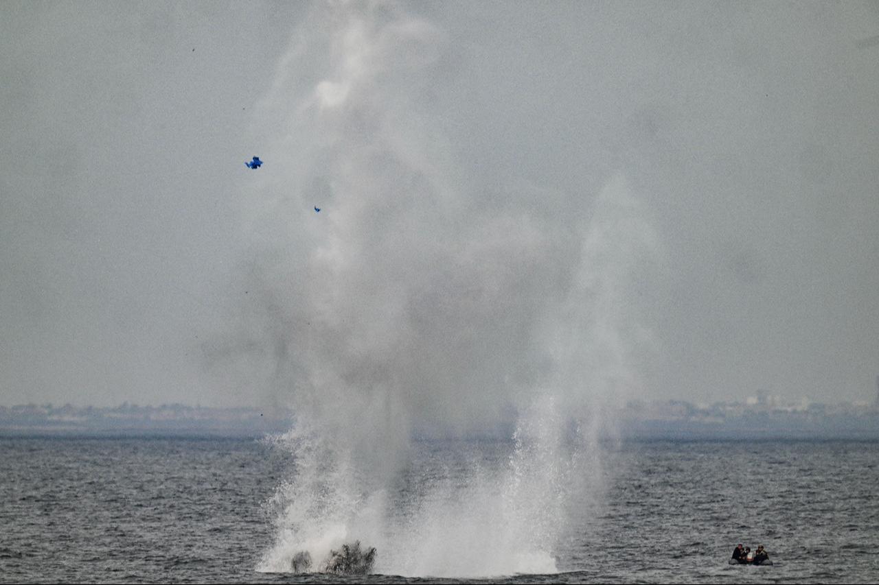 Military scuba divers (R) detonate an explosive charge to simulate the destruction of a mine off the Black Sea, during the "Sea Shield 24" exercise on April 16, 2024. (AFP Photo)