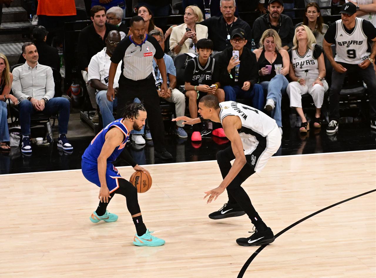 Jalen Brunson #11 of the New York Knicks dribbles the ball during the game against the San Antonio Spurs during Game Five of the 2026 NBA Finals on June 13, 2026 at Frost Bank Center in San Antonio, Texas. (AFP Photo)