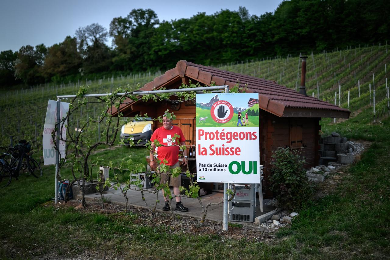 Olivier Agassis, a winegrower and local representative of the Swiss People's Party (SVP/UDC), poses in front of his vineyard hut in Bavois, western Switzerland, on May 1, 2026. (AFP Photo)