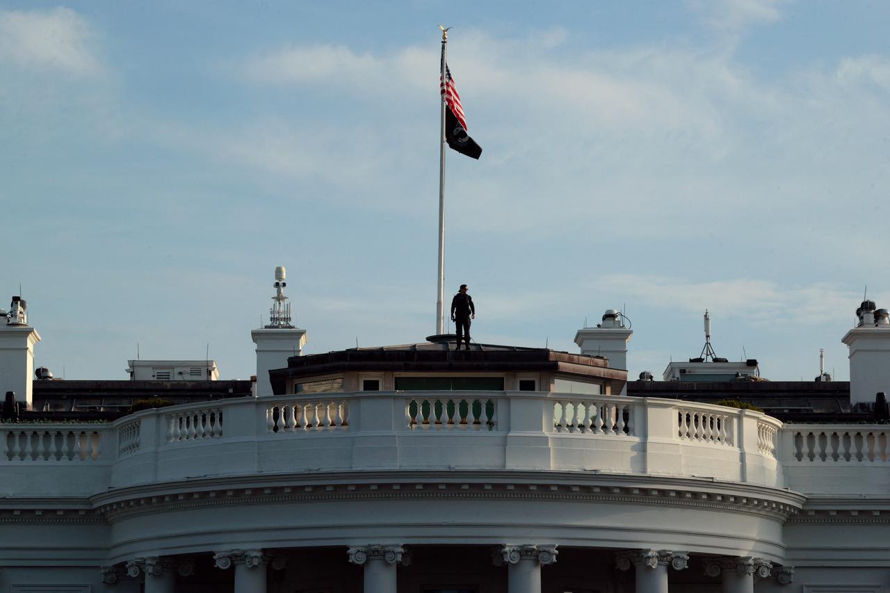 U.S. Secret Service keeps watch from the roof of the White House on June 11, 2026, in Washington, DC. (AFP Photo)