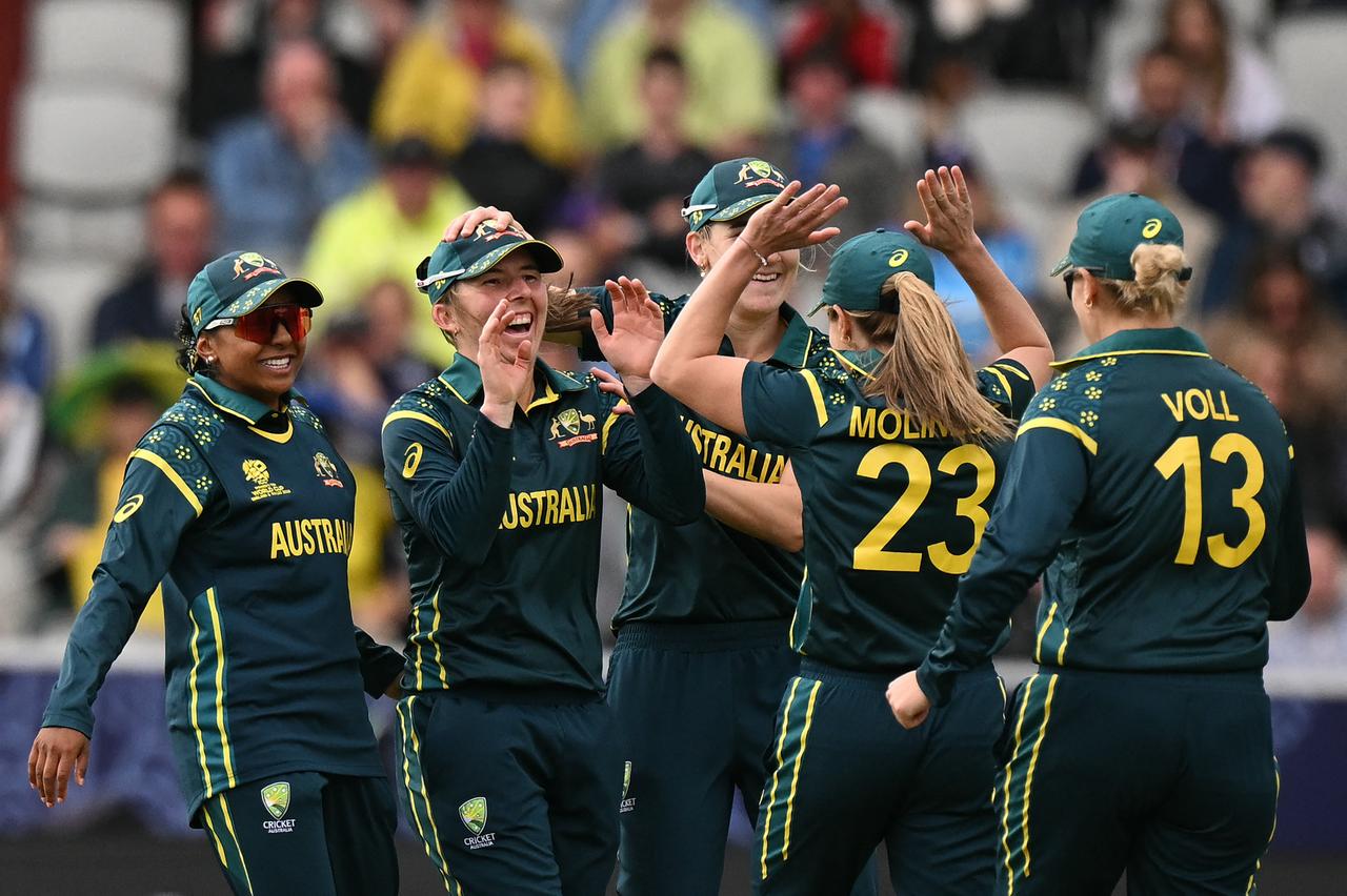 Australia celebrate during the ICC Women's T20 cricket world cup 2026 game between Australia and South Africa, at Old Trafford in Manchester, north-west England on June 13, 2026. (AFP Photo)