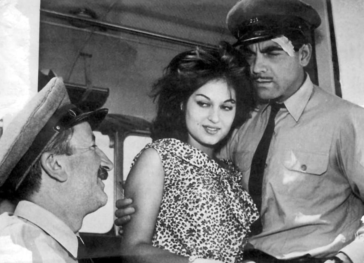 Ayhan Isik (R), Turkan Soray (C), and Salih Tozan (L) in Otobus Yolculari, 1961. (Photo via IMDb)