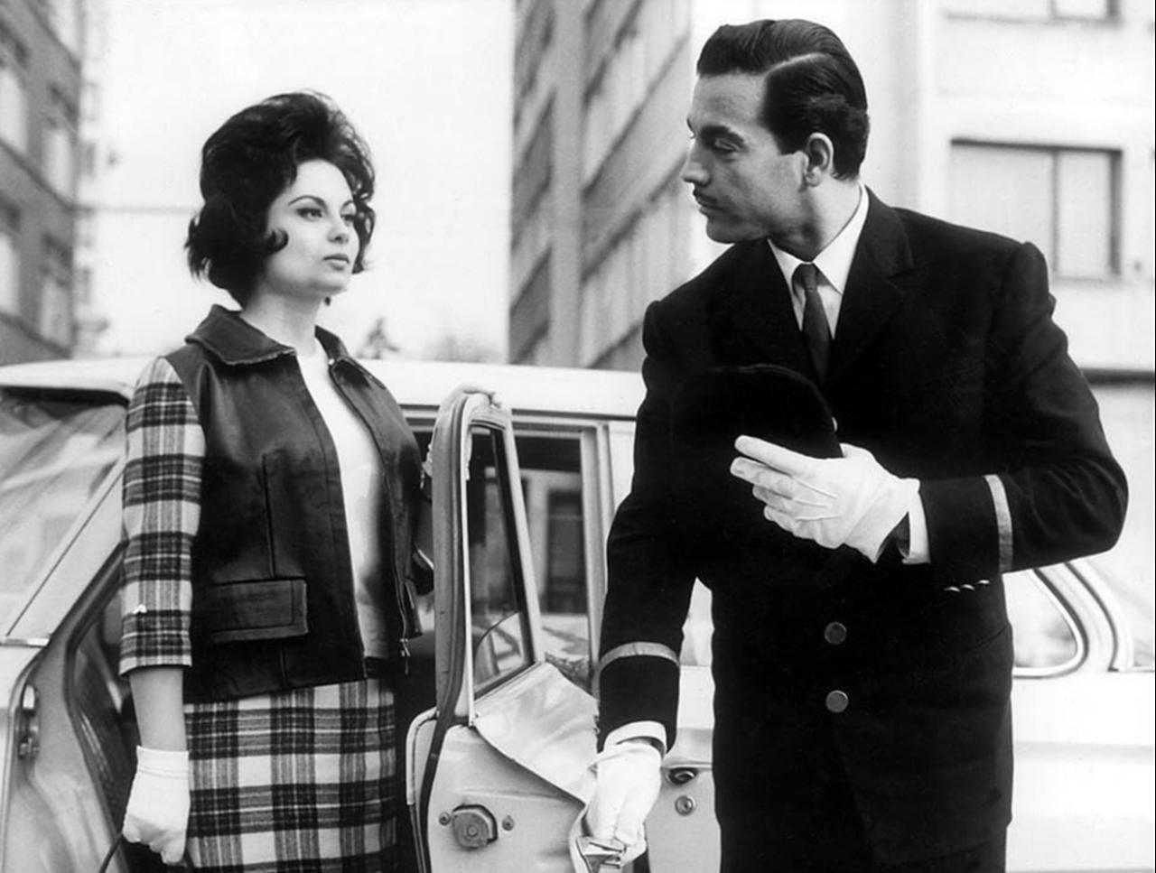 Belgin Doruk (L) and Ayhan Isik (R) in Kucuk Hanimin Soforu, 1962. (Photo via IMDb)