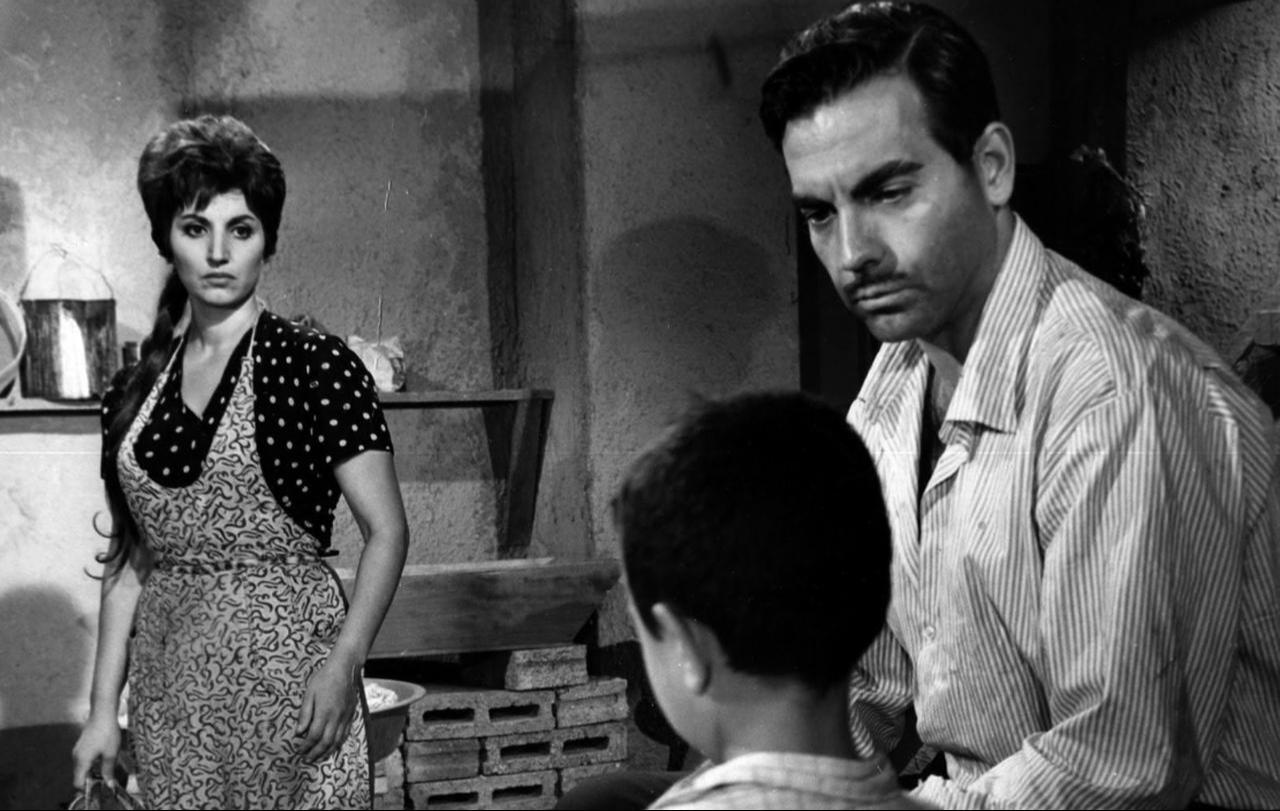 Ayhan Isik (R), Sezer Sezin (L), and Kucuk Kenan (C) in Uc Tekerlekli Bisiklet, 1692. (Photo via IMDb)